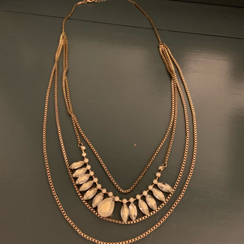 Francesca’s Gold Necklace w/ white/clear beading